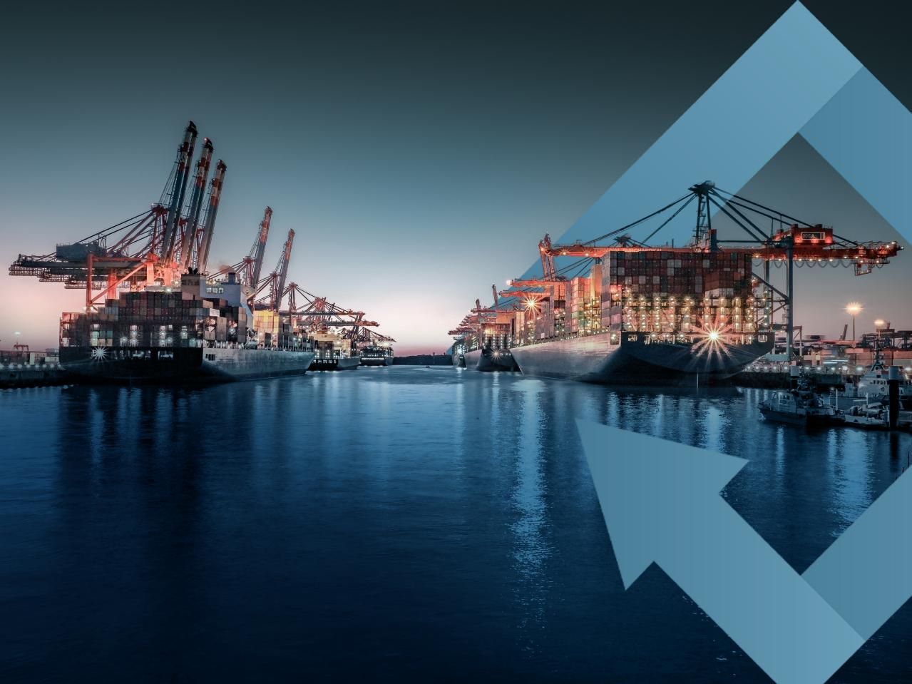 Buques portacontenedores en una terminal portuaria de noche